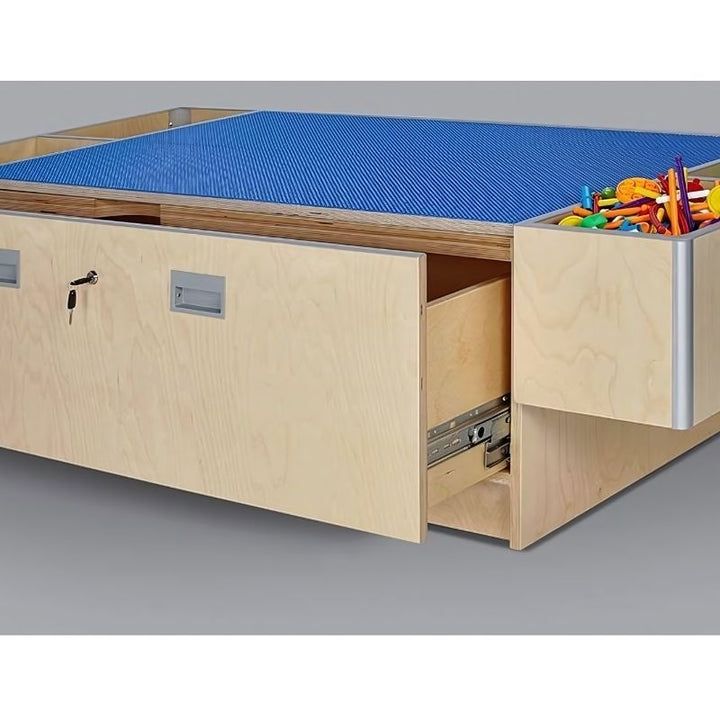 3branch Double Discovery Table with open floating storage bin, showing built-in integrated storage for classroom use