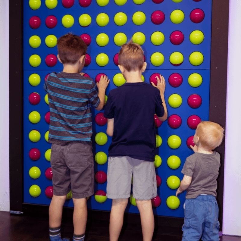 LiteZilla Spinfinity Whirly Wall - Three Boys Active Play
