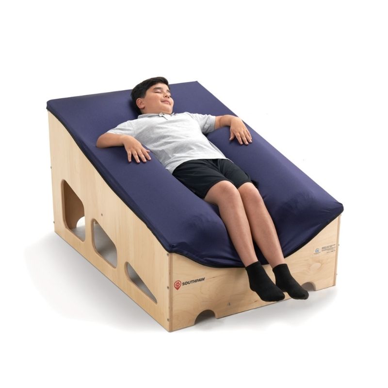 SouthpawSensoryLounger a boy lying on the lounger