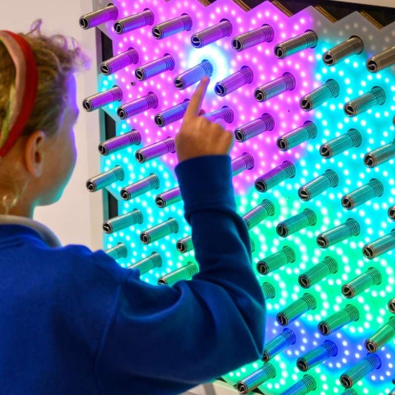 TFH Electro Wobble Garden Activity Panel - Kid touchinh the panel