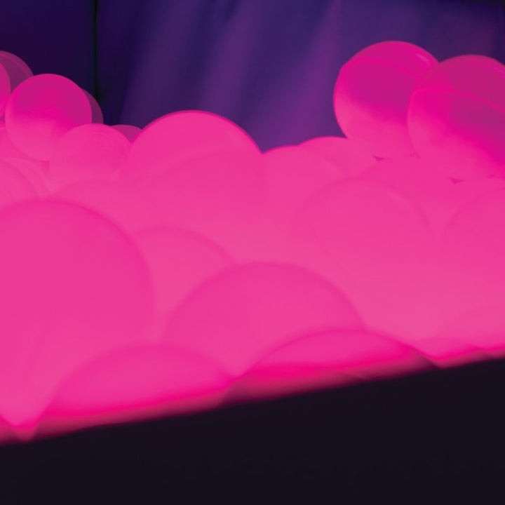TFH Large Light-Up Ball Pit - w/ 3000 Balls - pit balls in pink light - close up view