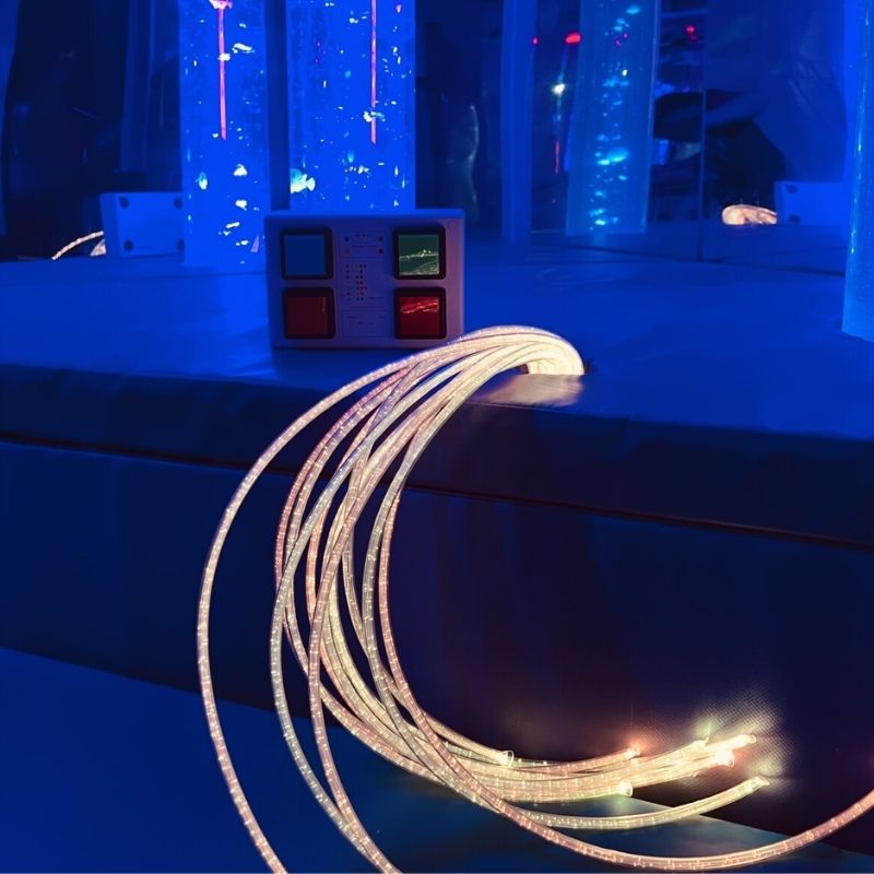 TFH Thick fiber Tails - w/ Light Source - Blue room view glowing fiber tails