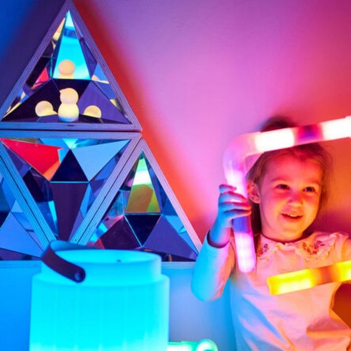 TTSKaleidoscopeMirror_4-girl playing in bluish red hue with the mirror