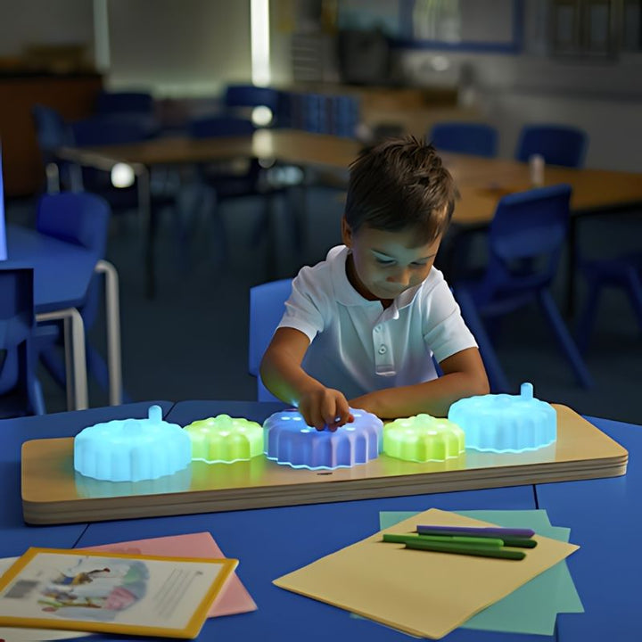 TTS Light Up Twist & Turn Cog Board - Boy Active Play on Blue Table
