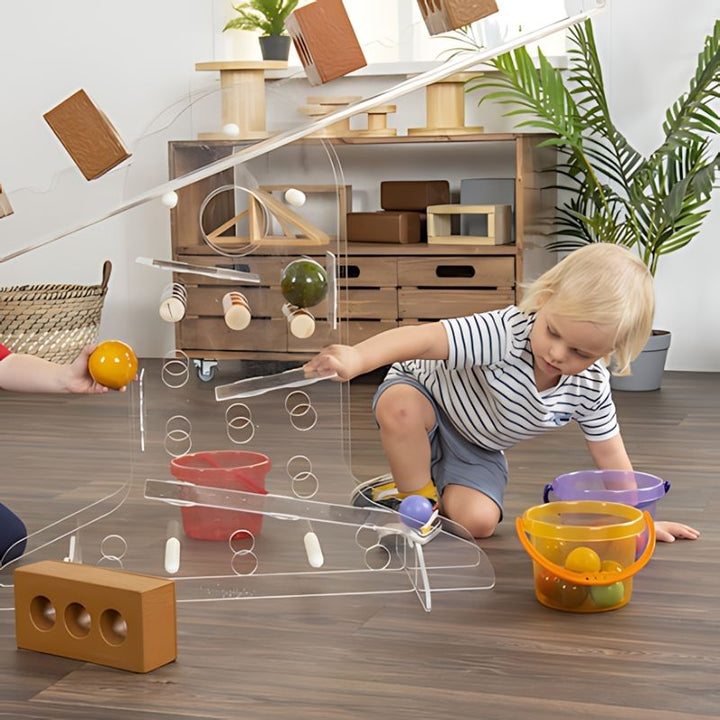 TTS STEAM Discovery Centre - Child in Stripes Play
