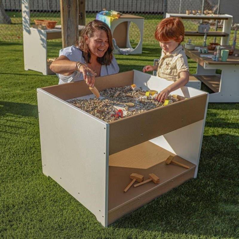 WhitneyBrothersoutdooredBigAndWideTable - Mom and Kid playing
