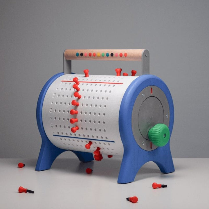 Ara Musique The Ara programmable cylinder music box landscape view showing the full instrument with colour-coded cylinder measures and diatonic scale handle, made in Quebec Canada