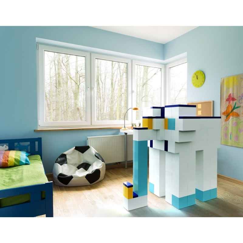 EverBlock Medium Starter Kit built into a tall tower structure in a kid's bedroom, showing giant building blocks used for imaginative play at home