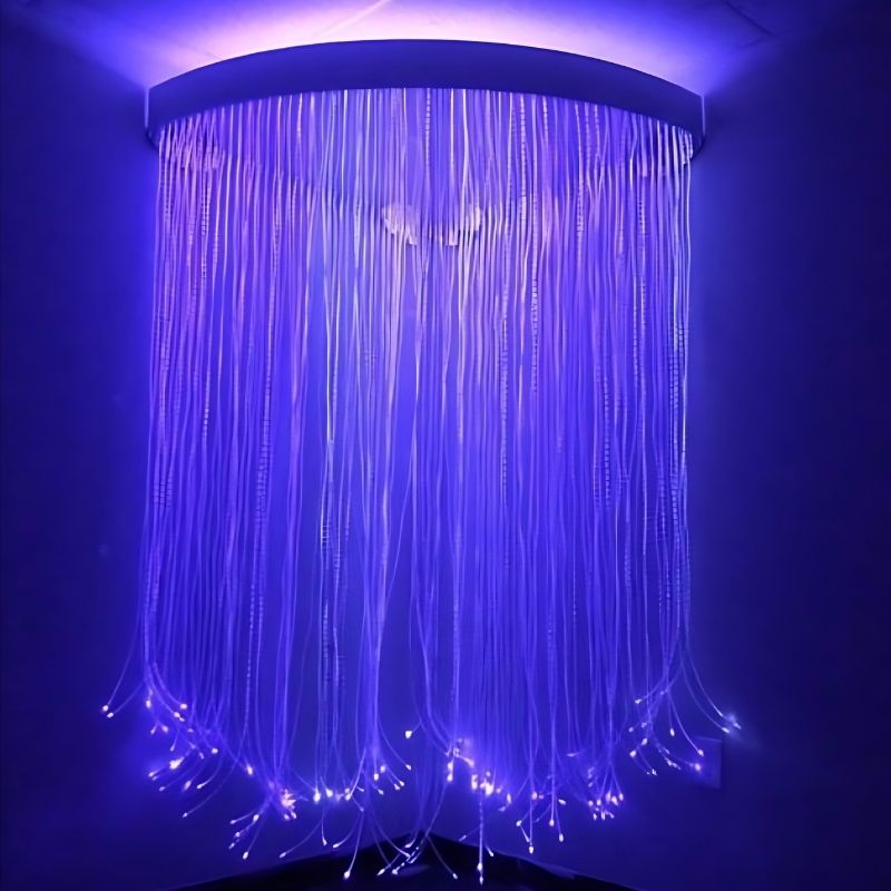 Experia Fibre Optic Sensory Corner Shower corner view in purple light showing the floor-to-ceiling fibre optic curtain installed in a sensory room corner with acrylic mirror ceiling