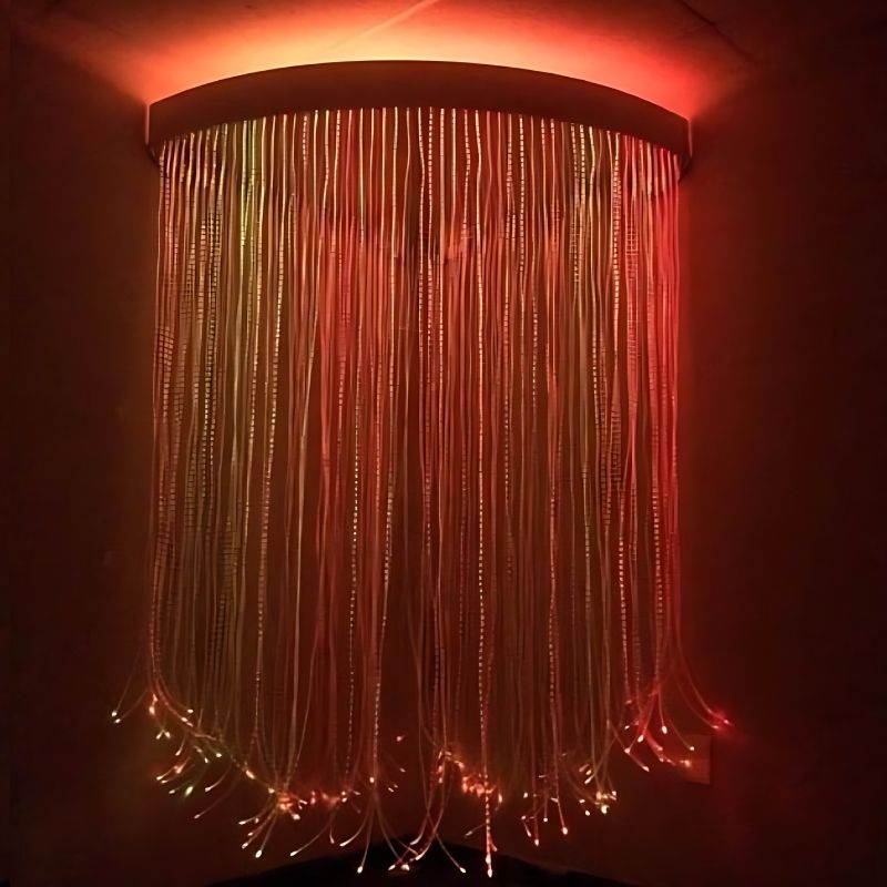 Experia Fibre Optic Sensory Corner Shower corner view in red light demonstrating the Calming or Superactive colour-changing LED fibre optic strands in a wheelchair-accessible corner installation