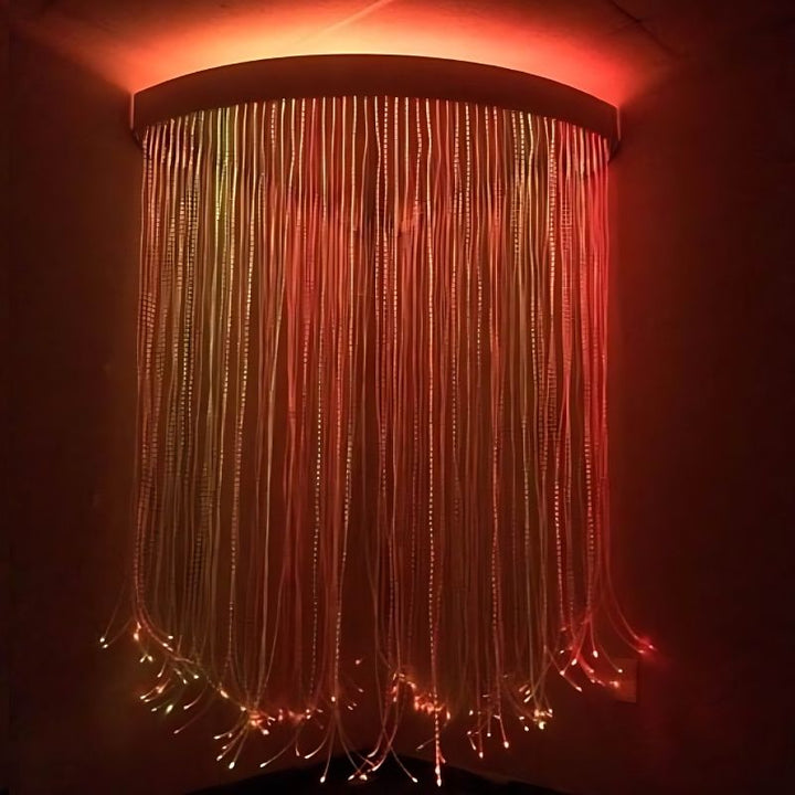 Experia Fibre Optic Sensory Corner Shower corner view in red light demonstrating the Calming or Superactive colour-changing LED fibre optic strands in a wheelchair-accessible corner installation