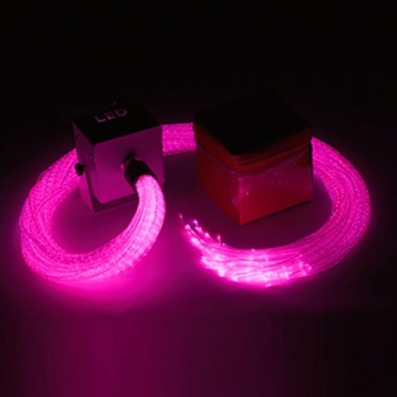 Close-up of the Experia IRiS LED Fibre Optic Bundle with Qube in purple light demonstrating the wireless colour-changing fibre optic strands for lap-safe sensory exploration