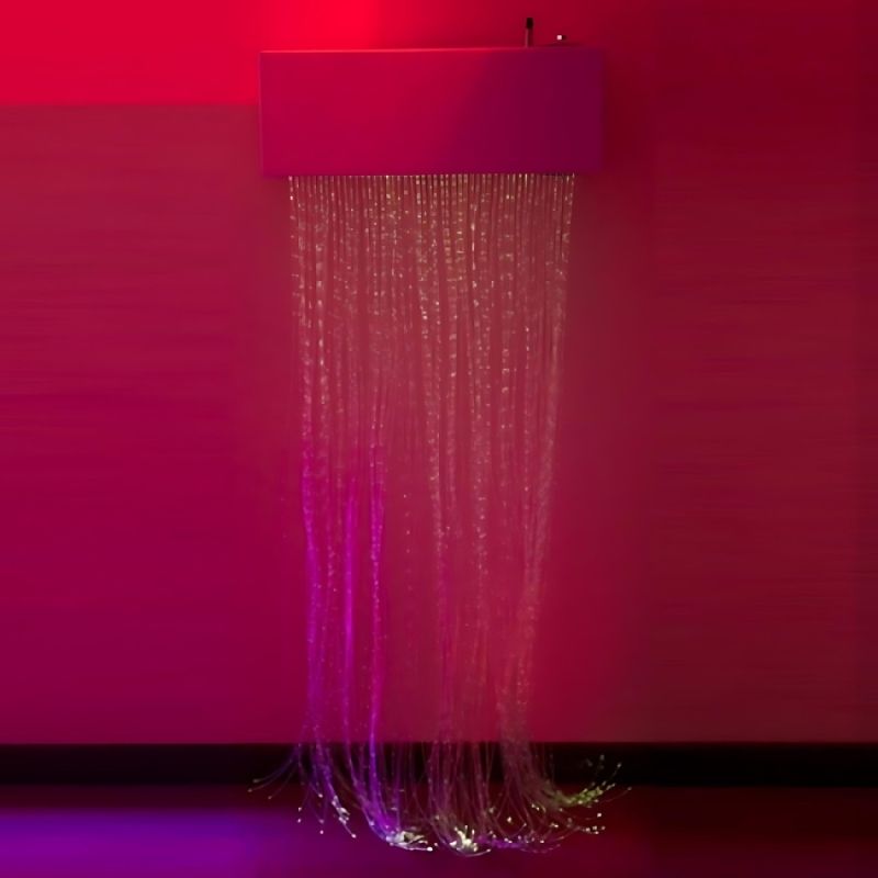 Experia LED Fibre Optic Wall Cascade front view in red light demonstrating the Calming auto colour-cycling of the 78-inch safe-to-touch fibre optic curtain