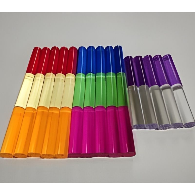 Top-down view of Experia PixelPop Interactive Light Panel pegs, showing the 1" diameter chunky coloured pegs that insert into the giant LED sensory peg board