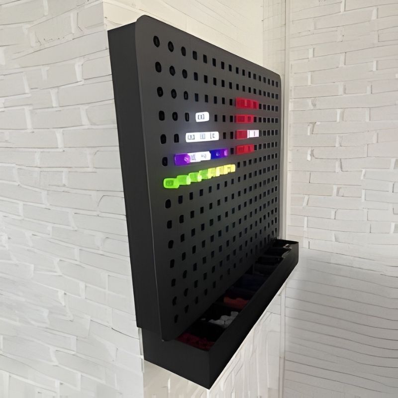 Side view of the Experia PixelPop Interactive Light Panel installed on a wall, showing the depth profile and wall-mount configuration of the 40"x32" LED sensory board