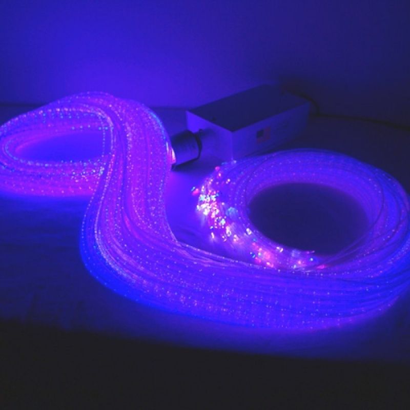 Experia Superactive LED Fibre Optic Bundle in deep purple light showing the vivid colour-change range of the portable lap-safe fibre optic sensory bundle