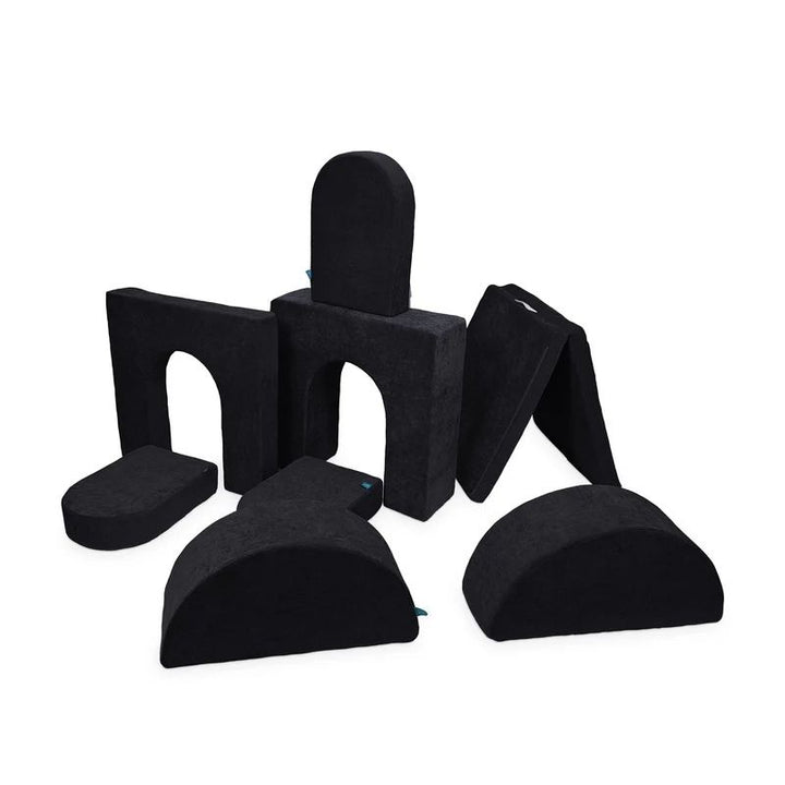 Go Coconut Architect Bundle in Blackberry Shadow showing the modular foam play couch with 8 pieces in five shape types including the exclusive half-moon rockers for dome and arch building configurations