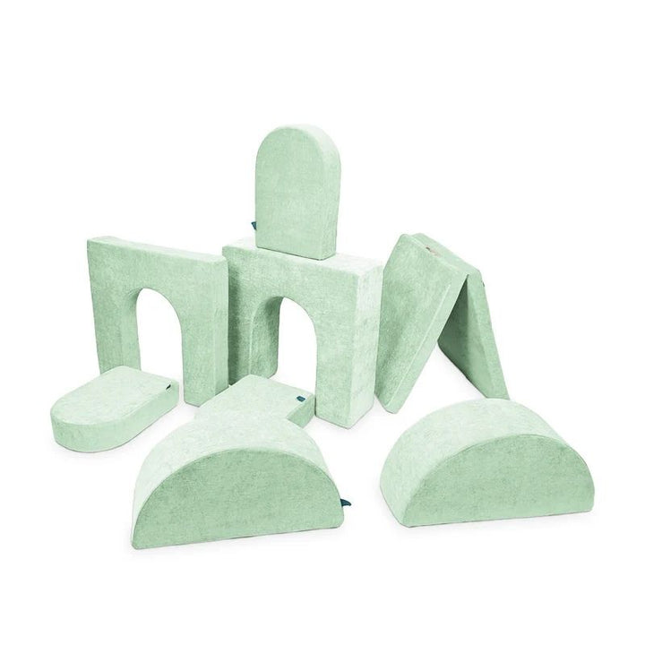 Go Coconut Architect Bundle in Cool Cucumber showing the full 8-piece modular foam play couch with exclusive half-moon rocker pieces for dome building, rocking arches, and tunnel configurations