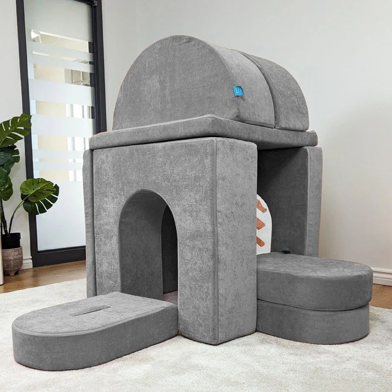 Go Coconut Architect Bundle configured as a dome or igloo showing the exclusive half-moon pieces used as curved arch segments to create an enclosed dome structure children can sit inside, the most distinctive configuration only possible with the Architect Bundle