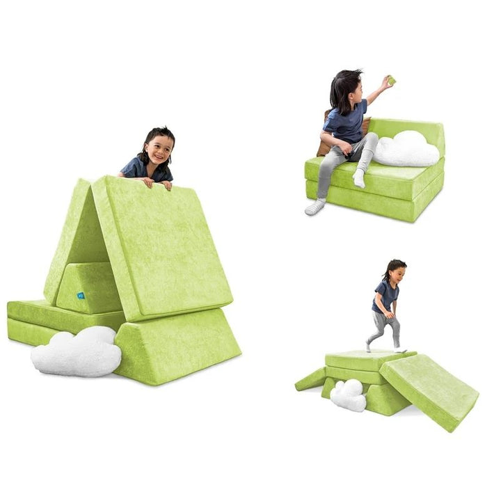 Child building and playing on Go Coconut - The Coconut in Lima Limon showing the open-ended Montessori-inspired foam configurations and sensory play value of the 100% Canadian-made play couch