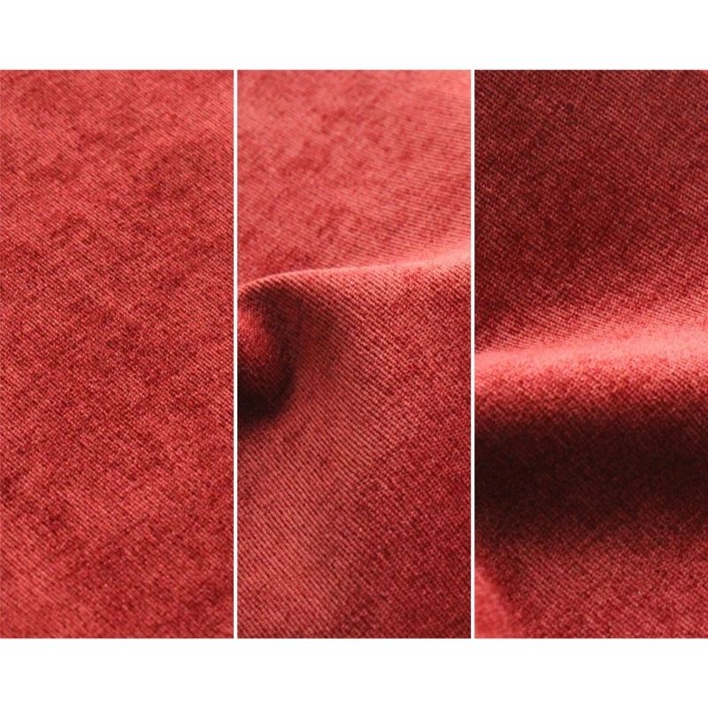 Close-up of Go Coconut - The Coconut in Brick Red showing the Durable Micro Velveteen fabric texture and micro-brushed finish of the removable machine-washable cover on the Canadian-made play couch