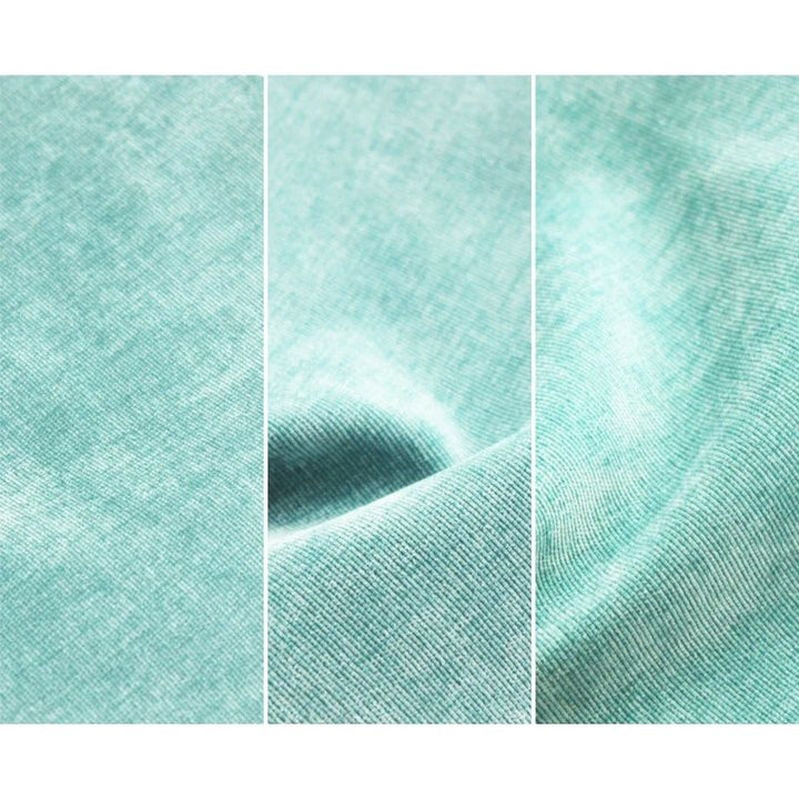 Close-up of Go Coconut - The Coconut in Sea Berry showing the Durable Micro Velveteen fabric texture and machine-washable removable cover construction of the 100% Canadian-made play couch