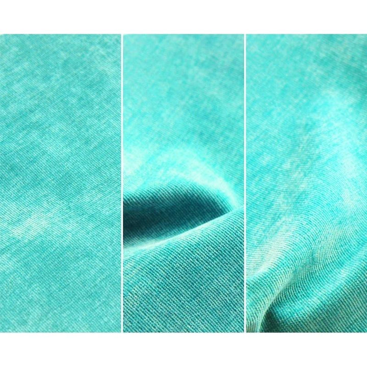 Close-up of Go Coconut - The Coconut in Tropical Teal showing the Durable Micro Velveteen cover texture and micro-brushed finish that may appear differently under various lights