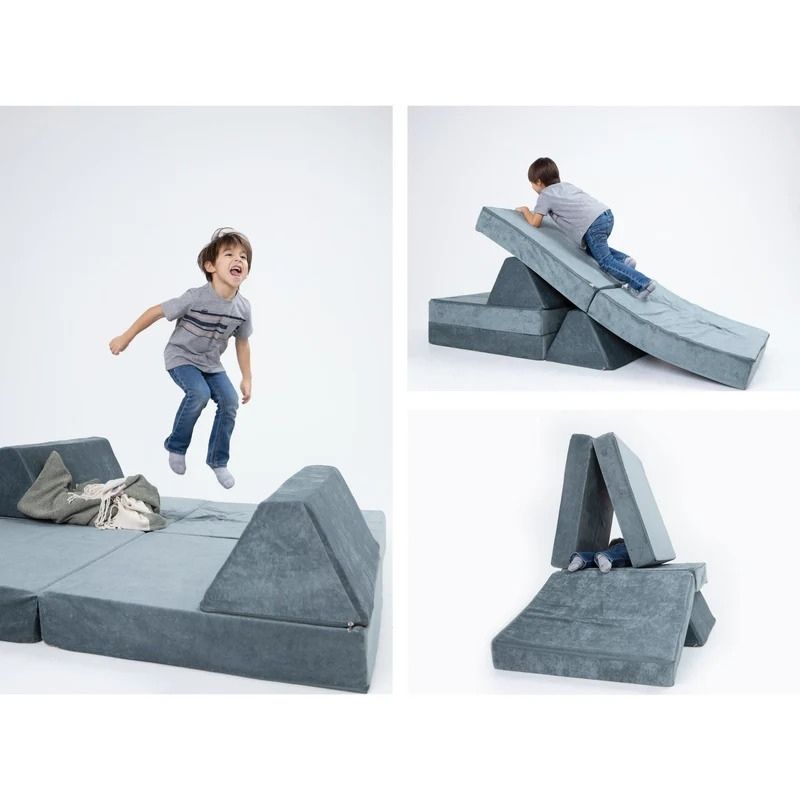Children building and playing on Go Coconut - The Coconut in River Stone showing multiple modular foam configurations of the 100% Canadian-made Montessori-inspired play couch