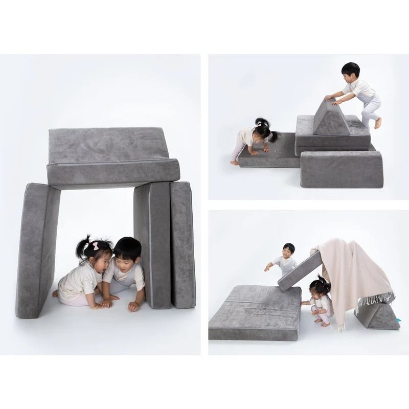 Children actively playing and building configurations on Go Coconut - The Coconut in Rhino Tango demonstrating the open-ended Montessori-inspired design of the Canadian-made modular play couch