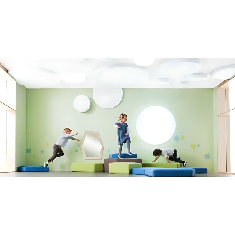 HABA Pro Grow.upp Abacustica acoustic ceiling panel set in light grey, showing multiple round sound-absorbing elements of varying diameters for classroom and sensory room noise reduction