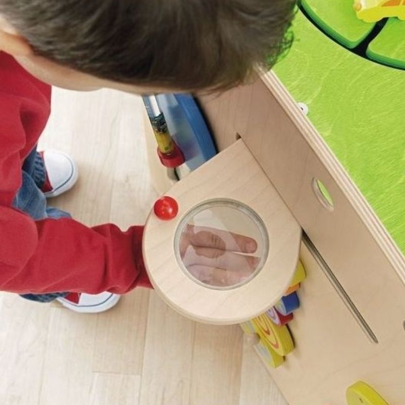 HABA Pro Multi Learning Cube in a paediatric waiting room or clinic setting - durable no-loose-parts sensory play cube for healthcare and therapy environments