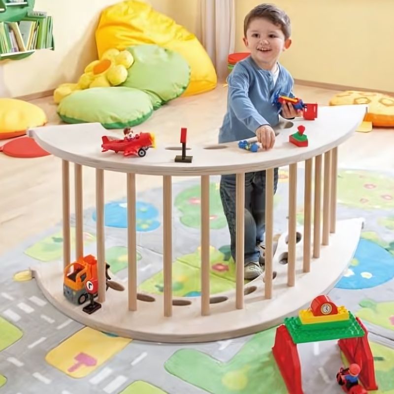 HABA Pro Climbing Arch in use with a toddler during active indoor play, supporting balance and coordination development