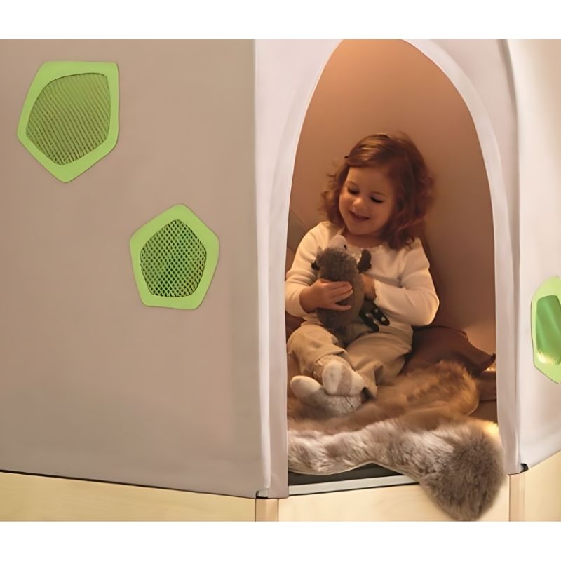 Child inside the HABA Pro Grow.upp Sensory Corner Cave Cover, exploring the enclosed sensory retreat space