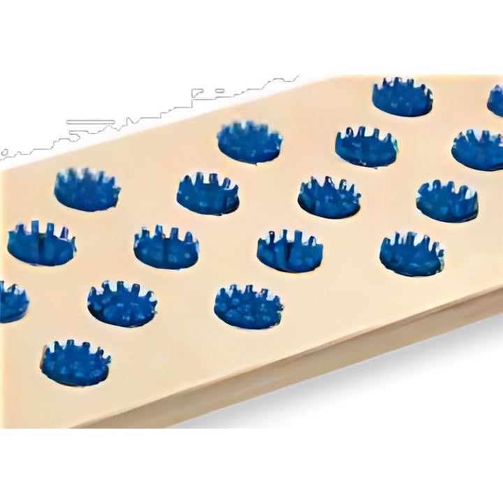 HABA Pro Fakir balancing board surface detail showing the plastic brush and domed wooden dowel textures that provide tactile sensory input for barefoot balance play
