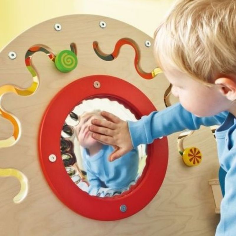 HABA Pro Sensory Snail motor activity elements including the squeeze mirror and push-back components that provide proprioceptive input and support fine motor development in toddlers