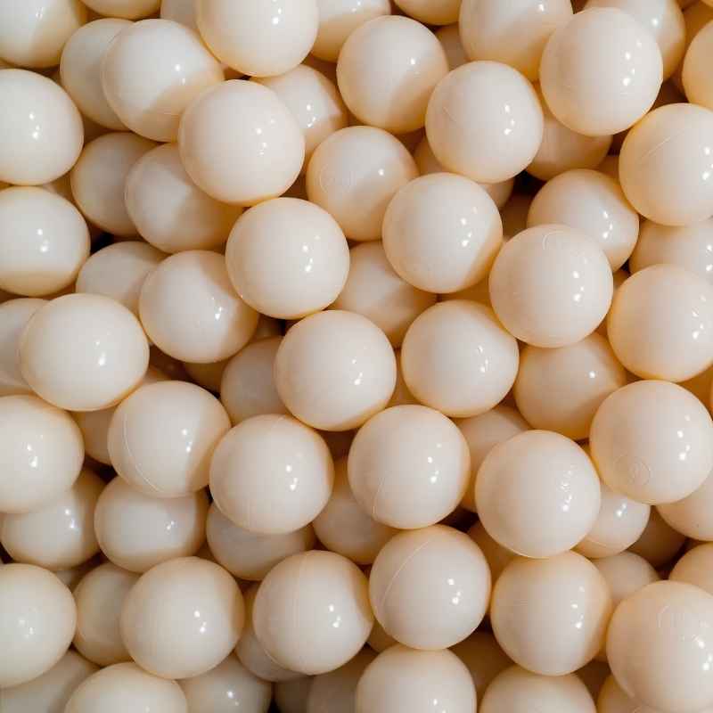 IGLU Ball Pit Balls 500pc in Light Beige, a close-up of 500 warm ivory-toned 7cm sensory play balls for calming ball pit play in sensory rooms and home playrooms