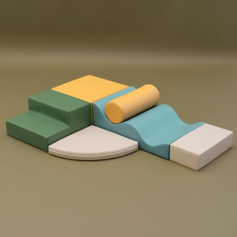Rendered view of the IGLU Explorer Soft Play Set in a green, yellow and teal colourway, foam shapes arranged for toddler play