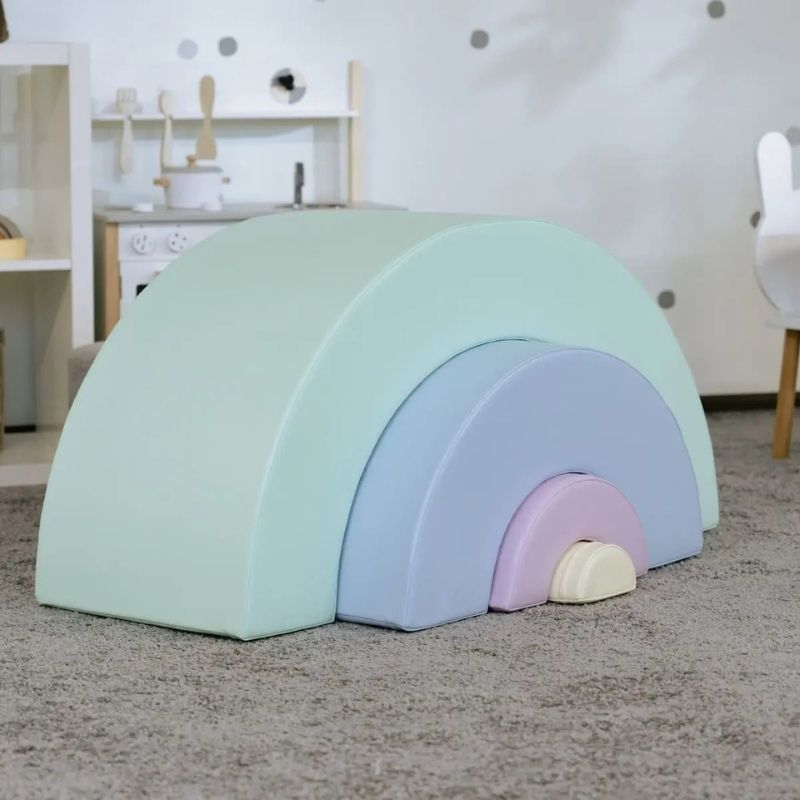 IGLU Montessori Soft Play Set - Rainbow, four vibrant foam arcs arranged as a landscape for climbing and sensory play