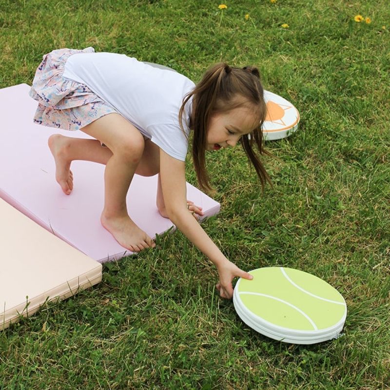 IGLU Safety and Comfort 5 Mat Set used outdoors for active play, showing the portable and lightweight design of the foam soft play mats