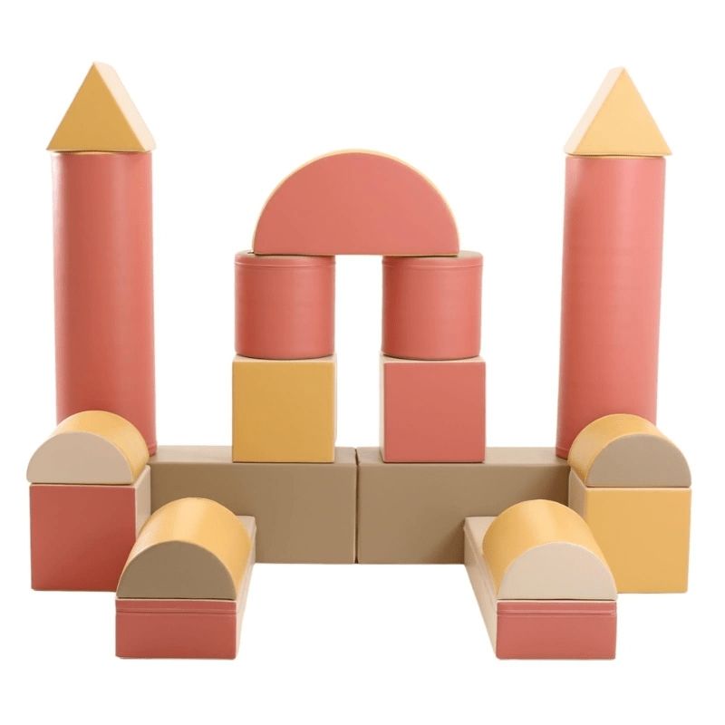 Front view of the IGLU Soft Play Fortress Set in pastel pink, displaying the complete foam building block castle configuration and colour finish