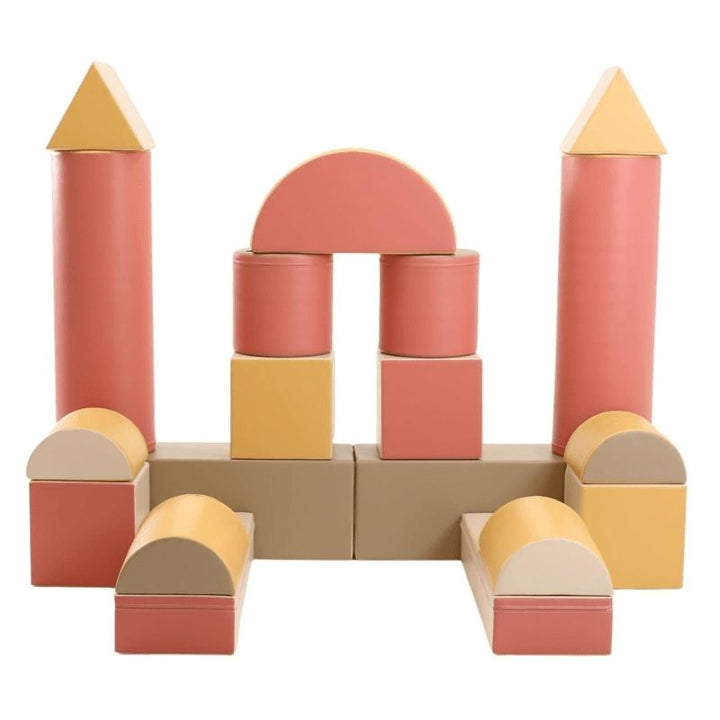 Front view of the IGLU Soft Play Fortress Set in pastel pink, displaying the complete foam building block castle configuration and colour finish
