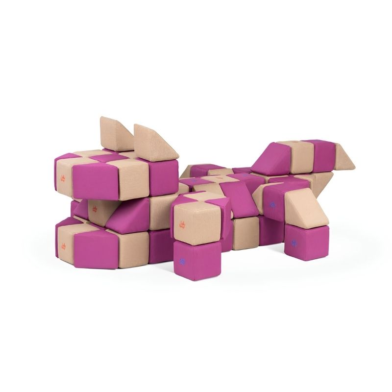 An animal-shaped structure built from JollyHeap Basic Set magnetic foam blocks, showing the creative figures children can create with this soft play block set.