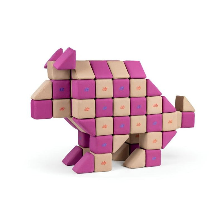 A pig-shaped figure built from JollyHeap Basic Set magnetic foam blocks, rounding out the animal build examples for this soft play block set.