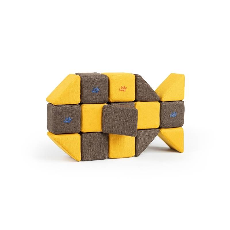 A close-up view of a fish shape built from JollyHeap Medium Set magnetic soft blocks, showing tail and body detail