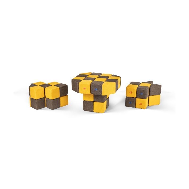 Three small separate constructions built from JollyHeap magnetic soft blocks, including a table-like form