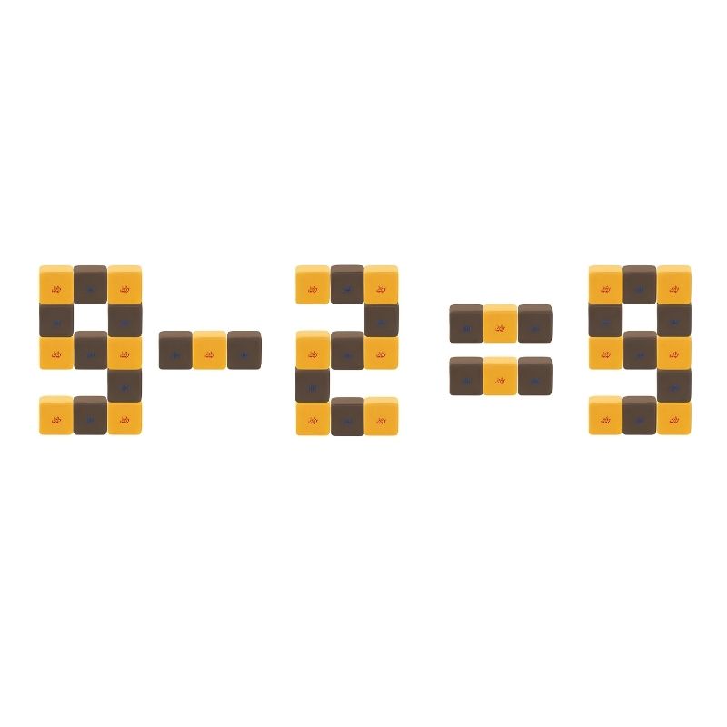 JollyHeap magnetic soft blocks arranged into numeral and symbol shapes, showing early counting and math play with the Medium Set