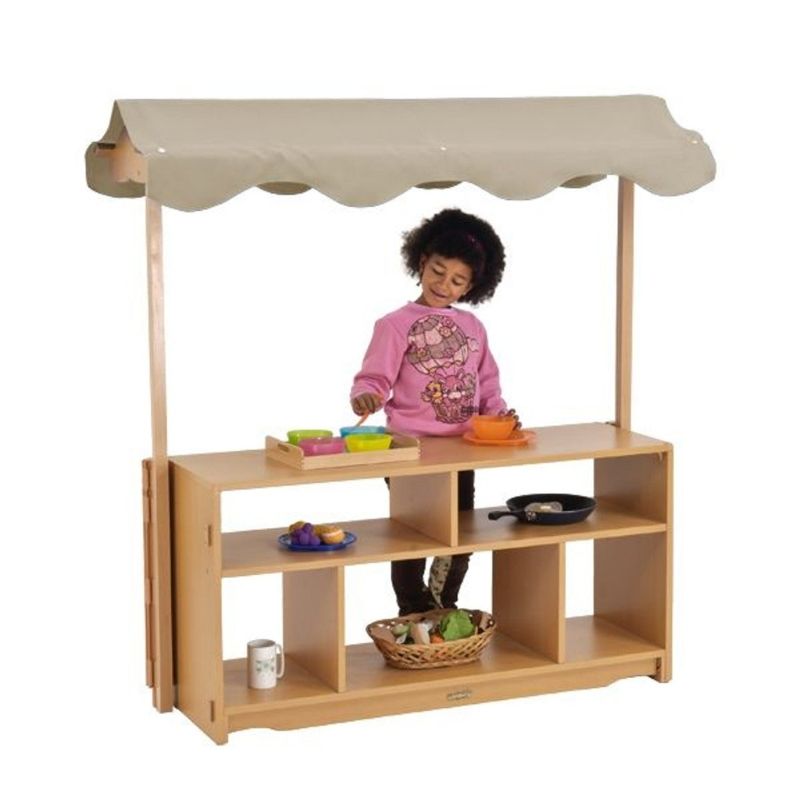 Kinderhuis Eloise Canopy unit side view showing natural birch wood construction and open-ended dramatic play design for preschool classrooms