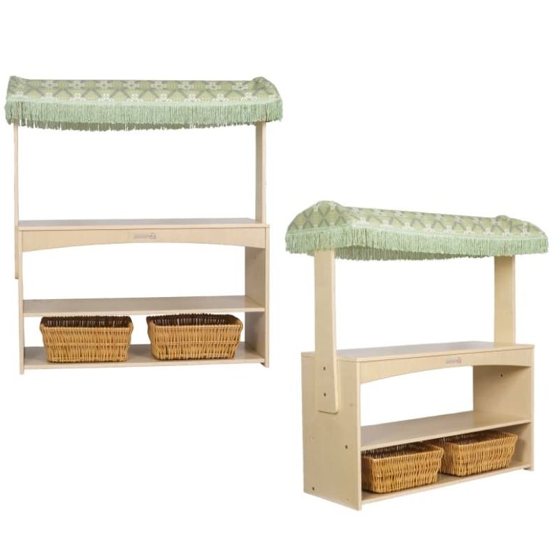 Kinderhuis Leo Dramatic Play Unit front and side view showing the birch wood counter with canopy and included wicker baskets, ideal for dramatic and pretend play