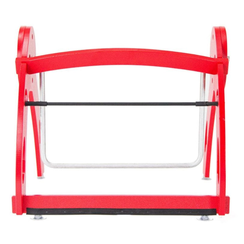 Kinnebar Foot Swing K100 in red shown from the front, a portable under-desk movement tool for children at school desks