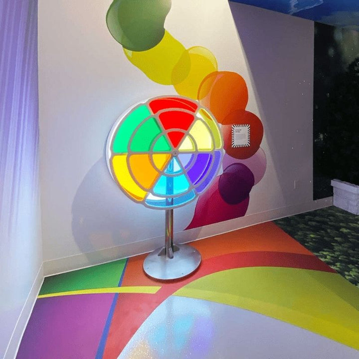 Close view of LiteZilla Chroma Wheel vibrant acrylic colour panels blending primary and secondary hues as the wheel is turned